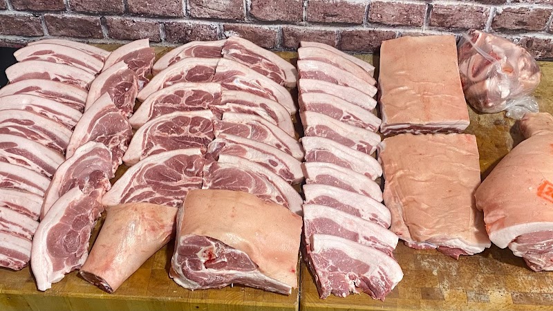 Freshly cut pork portions from Azren Farms-Farm Fresh Meats, ready for sale in Elgin, WA.